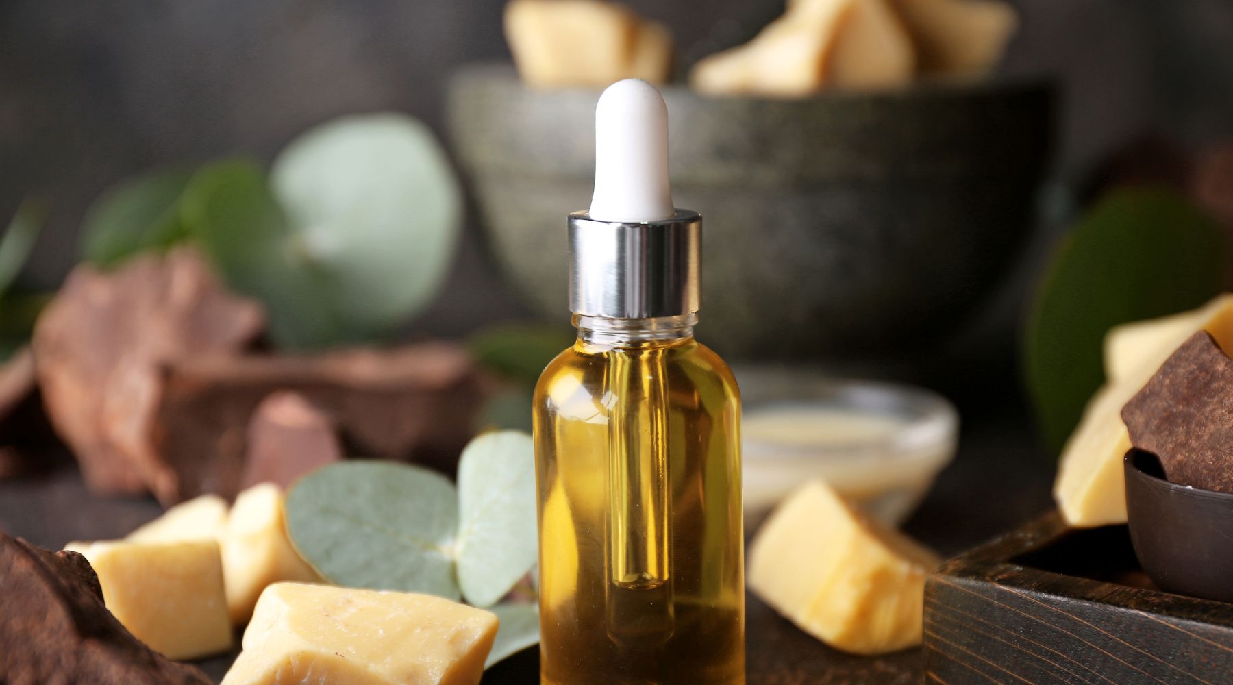 Cocoa Butter Oil on Dark table by pixelshot on Canva